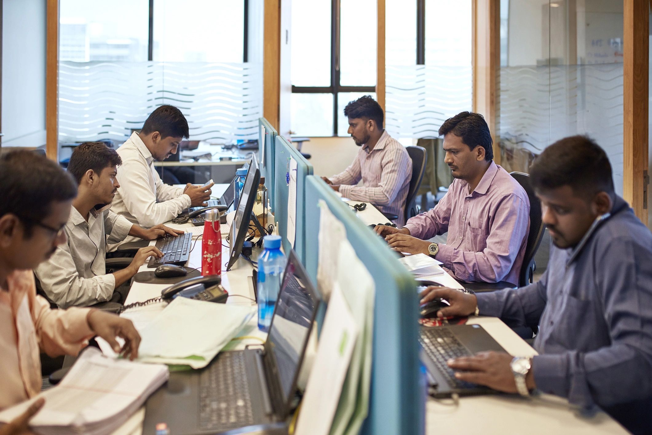 Male professionals working at creative office