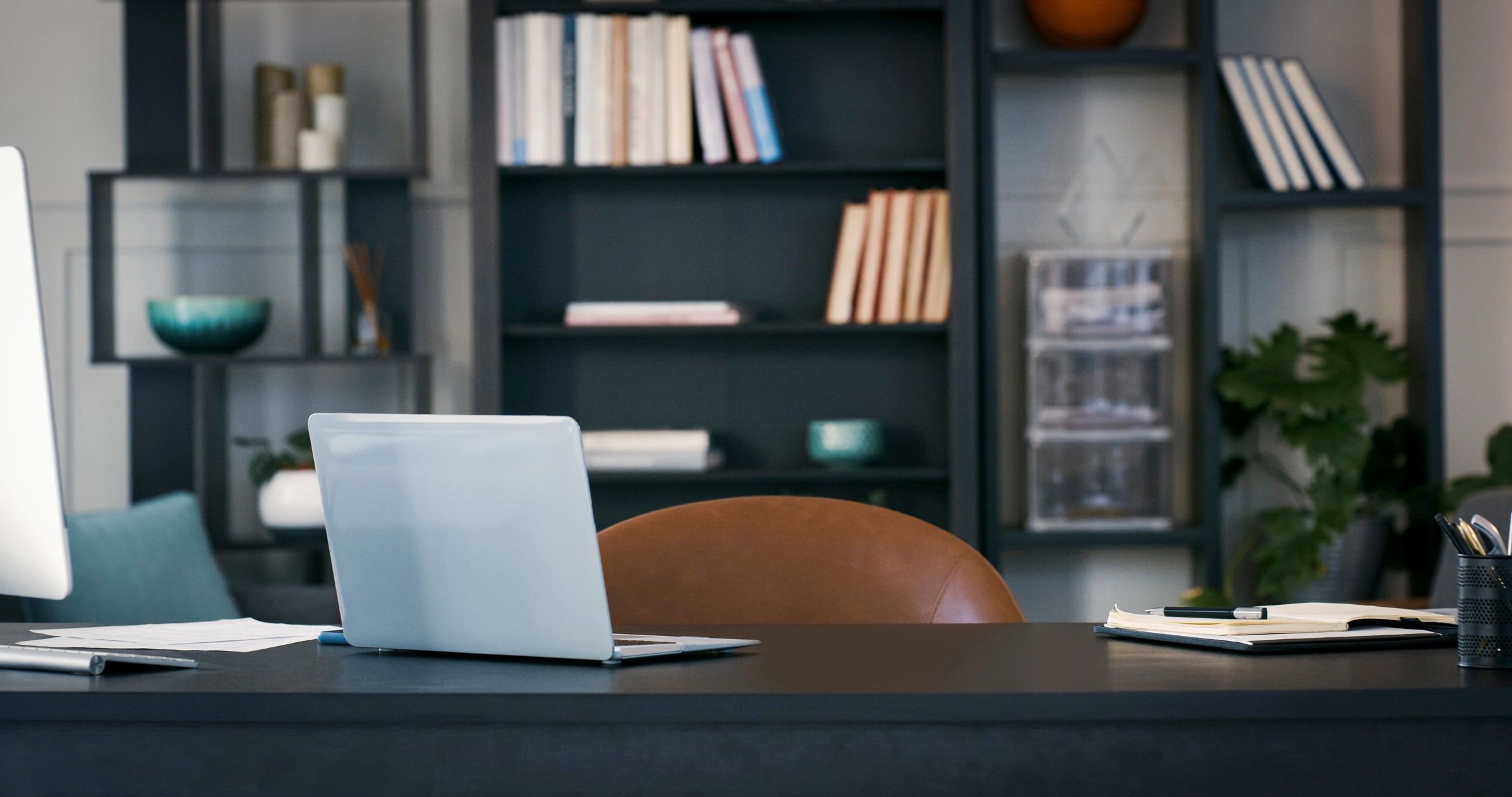 Laptop and workspace representing technology coverage