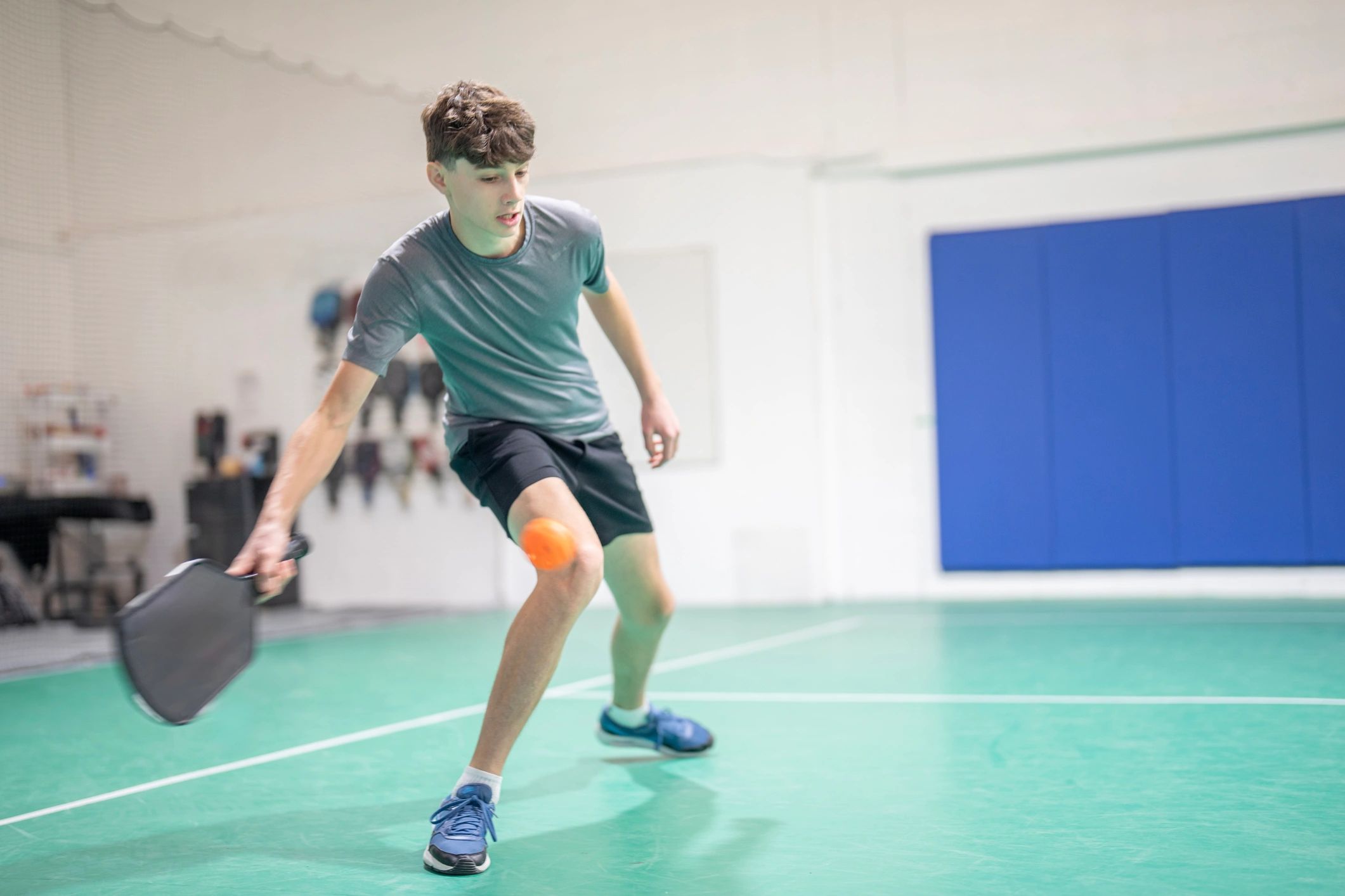 Indoor racket sport action