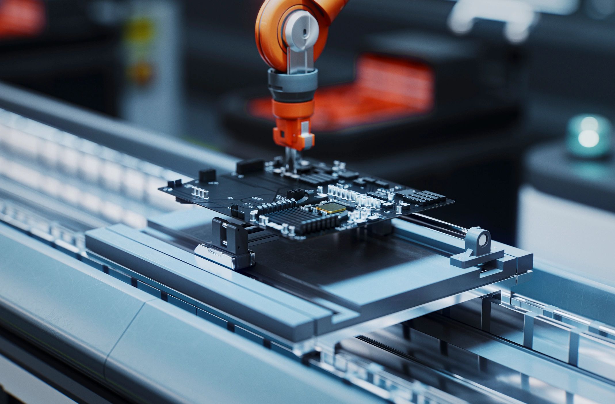 Robotic arm assembling electronics on a high-tech production line