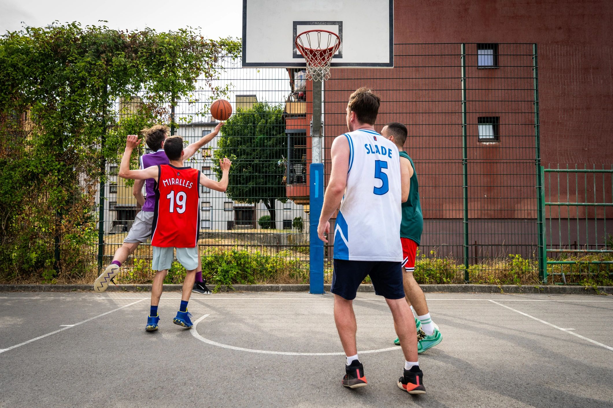 Basketball game on an outdoor court