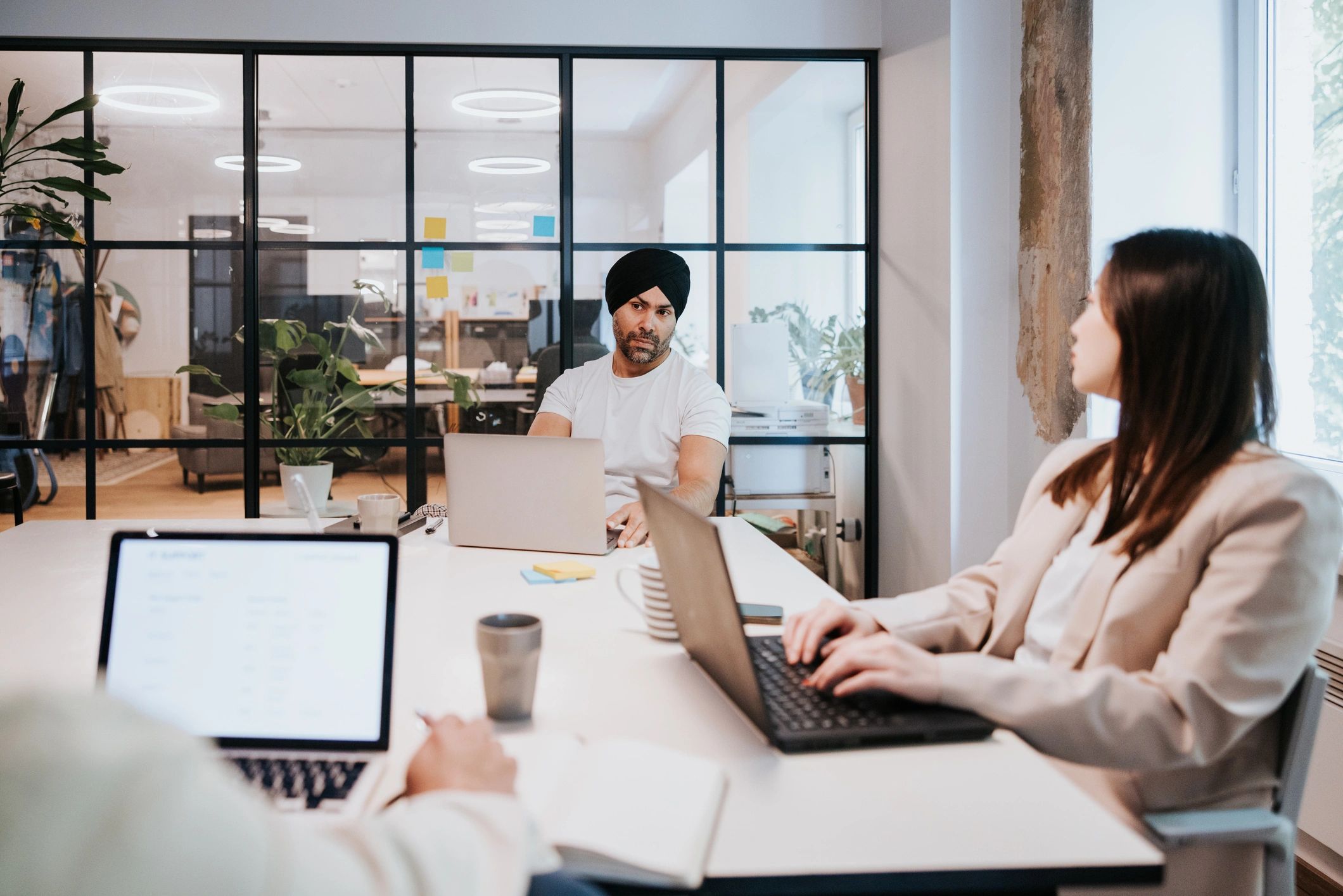Editorial team collaborating in a modern office