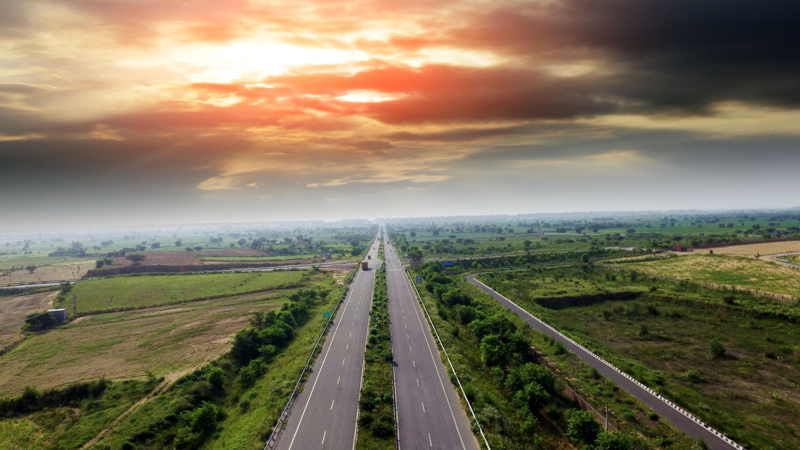 Aerial view of a highway, representing mobility and auto coverage
